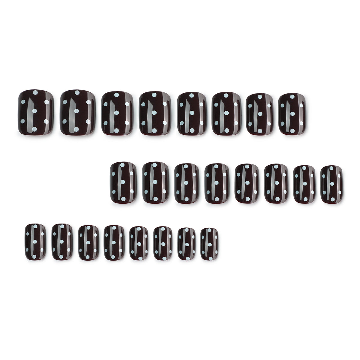 Set of 24 black square press-on nails with white dots laid in rows