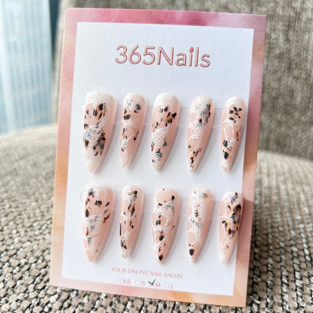 Femme Fatale: "Wild Lace" – Nude Base with Leopard Print & White Fishnet Lace Overlay Long Stiletto Nails