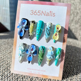 Sculpted Flora: "Cyber Iris Rain" – 3D Blue Iris & Cyan Ink Smudge with Dewdrops Stiletto Nails