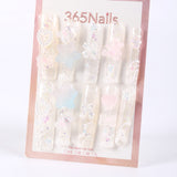 365Nails Iridescent Jelly Long Coffin Press On Nails with 3D Stars, Bows and PearlsSold in packs of 5. Minimum order: 1 pack (5 pcs). Quantity = number of packs. Qty 1 = 5 pcs