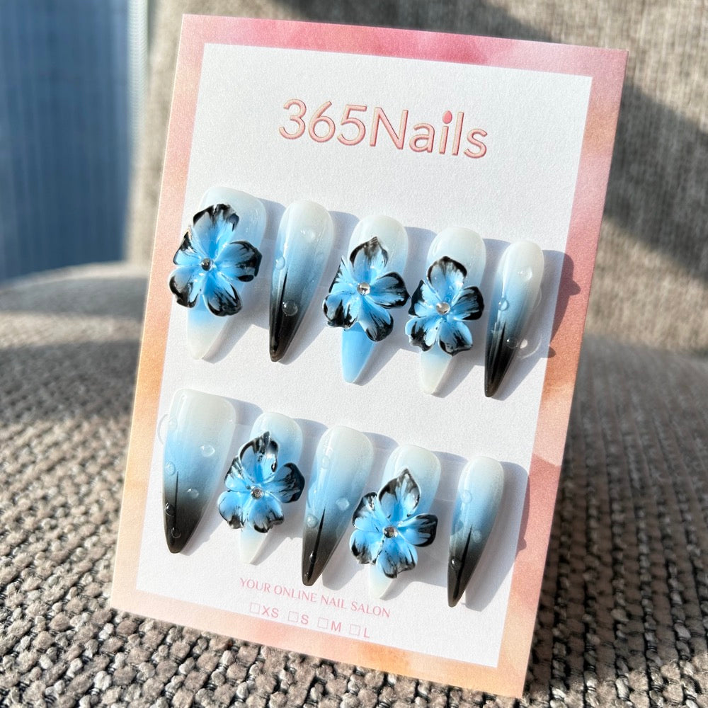 Sculpted Flora: "Ink Blue Lotus & Icy Dew" – 3D Blue & Black Flowers on Ombre Stiletto Nails with Dewdrops