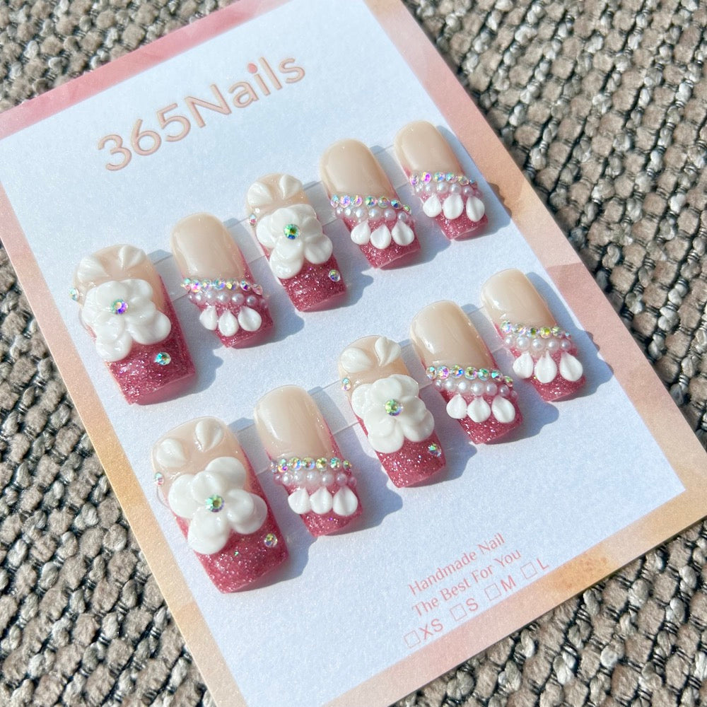 Sculpted Flora: "Pink Crystal Blossom" – 3D White Floral & Glitter Pink French Square Nails
