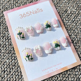 Sweet & Dopamine: "Sugar Pink Tulip" – Glitter Pink Base, 3D Yellow Tulips, White Bow & Pearl Chain Press-on Nails