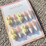 Sculpted Flora: "Creamy Jasmine" – 3D Soft Yellow Flowers with Pearl Accents on Elegant French Tip Almond Nails