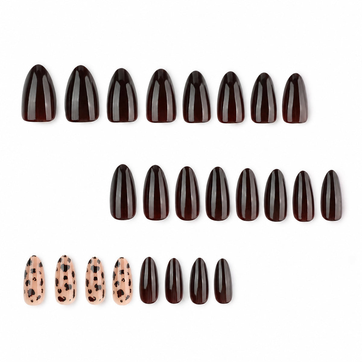 Set of dark brown and leopard print almond press-on nail tips laid out in rows on white background