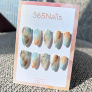 Ethereal Ink: "Coastal Amber" – Icy Blue & Caramel Sand Marble with Gold Flakes & Ink Smudge Almond Nails