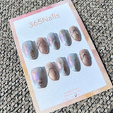 Ethereal Ink: "Aurora Nude Glow" – Nude Beige Cat Eye & Purple Aurora Marble with 3D Silver Arc Oval Nails