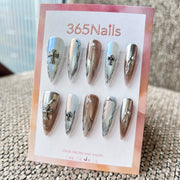 Femme Fatale: "Chrome Saint" – Icy Aurora & Metallic Bronze Mix with 3D Gothic Cross & Liquid Silver Lines Long Stiletto Nails
