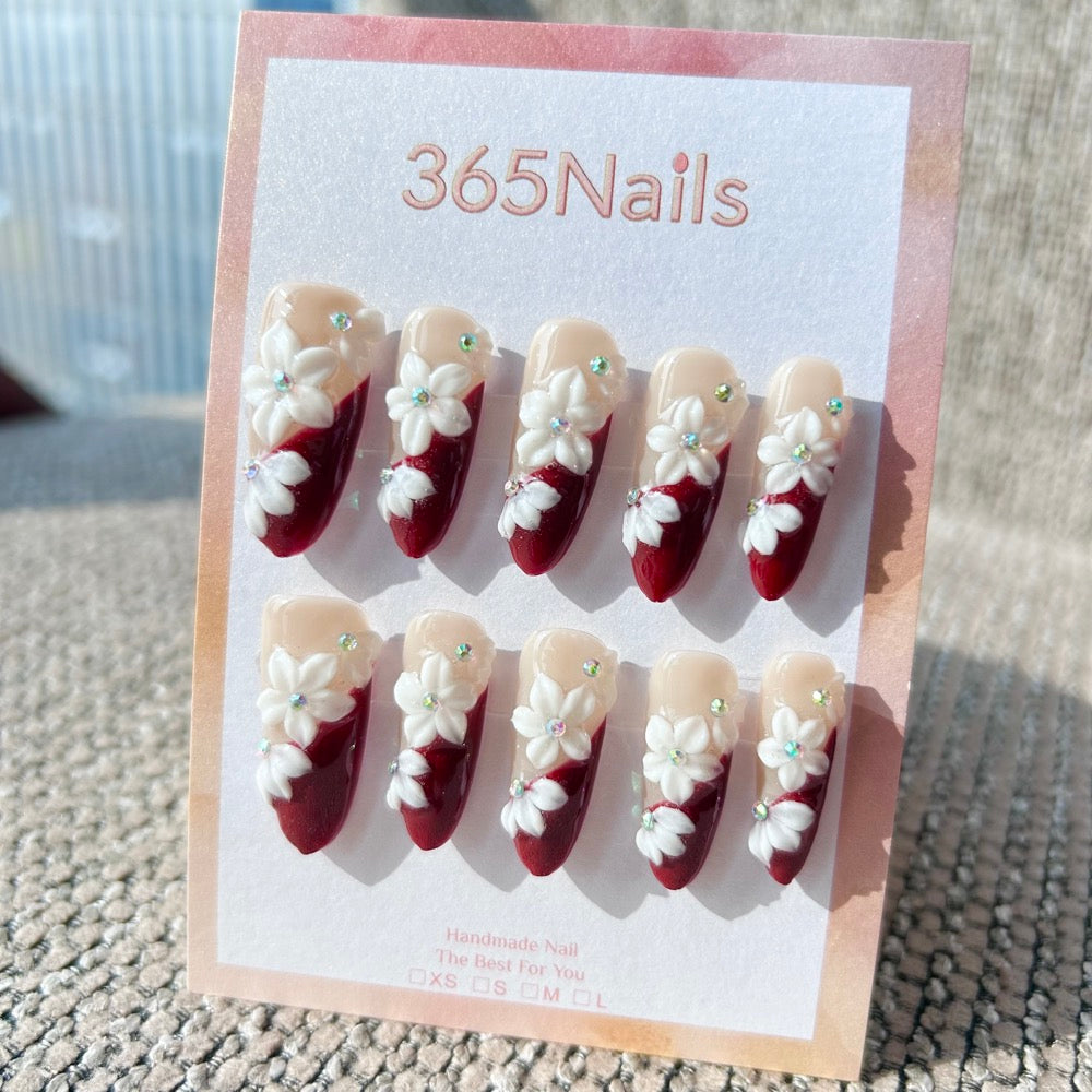 Sculpted Flora: "Crimson Lily" – 3D White Floral & Burgundy French Tip Long Almond Nails