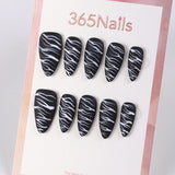 Simple hand-made black and white pattern press on nails