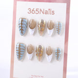 Blue and Gold Geometric Press-On Nails with Metallic Flower Details