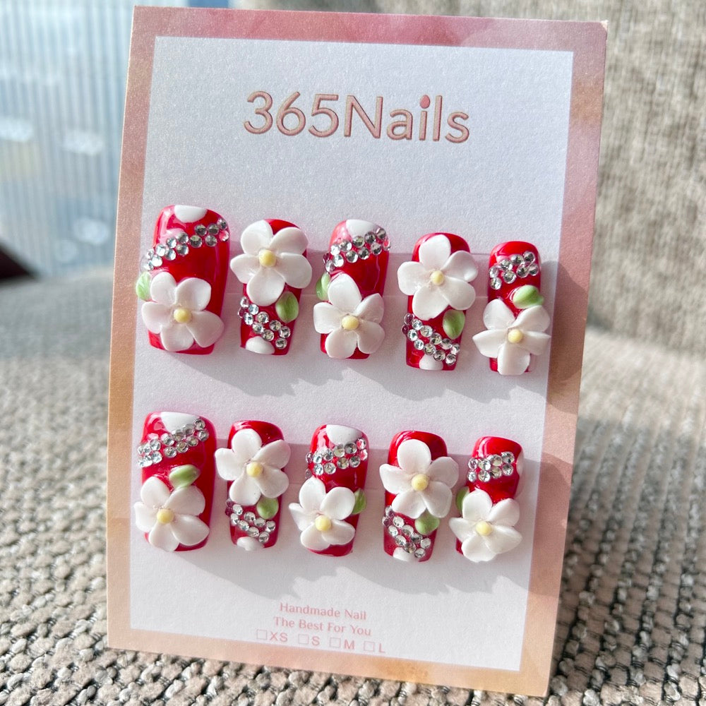 Sculpted Flora: "Ruby Floral Bling" – 3D White Flowers & Rhinestones on Classic Red Square Nails