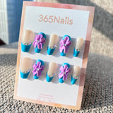 Sculpted Flora: "Blue Iris & French Crystal" – 3D Purple Iris Flowers on Bright Blue French Tip Coffin Nails