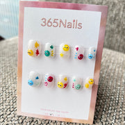 Cartoon & Dopamine: "Happy Little Blobs" – 3D Colorful Monster Eyes, Star Doodles & Shimmer Base Short Nails