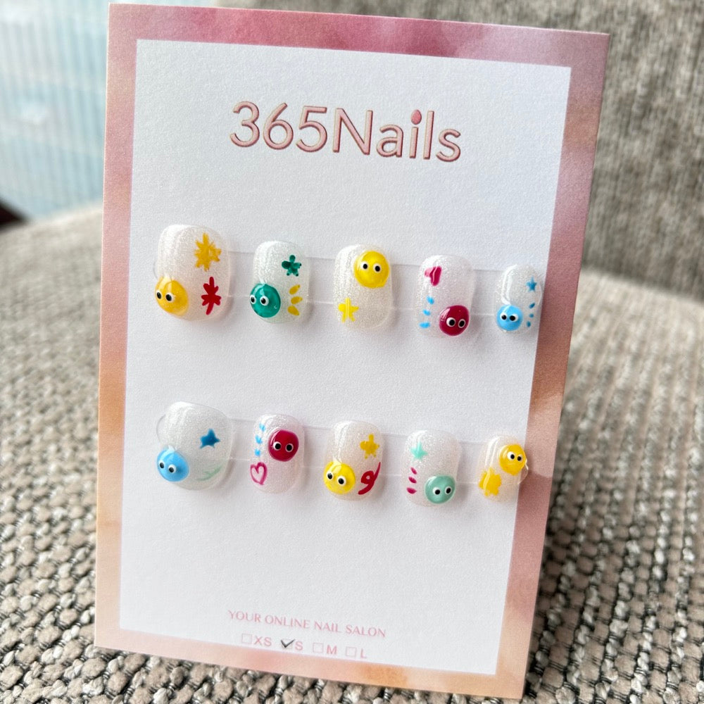 Cartoon & Dopamine: "Happy Little Blobs" – 3D Colorful Monster Eyes, Star Doodles & Shimmer Base Short Nails