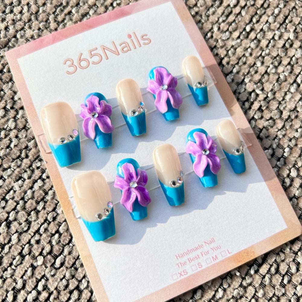 Sculpted Flora: "Blue Iris & French Crystal" – 3D Purple Iris Flowers on Bright Blue French Tip Coffin Nails