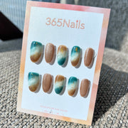 "Coastal Azure Sand" – Teal Blue & Beige Ocean Marble with Champagne Cat Eye & Gold Foil Oval Nails