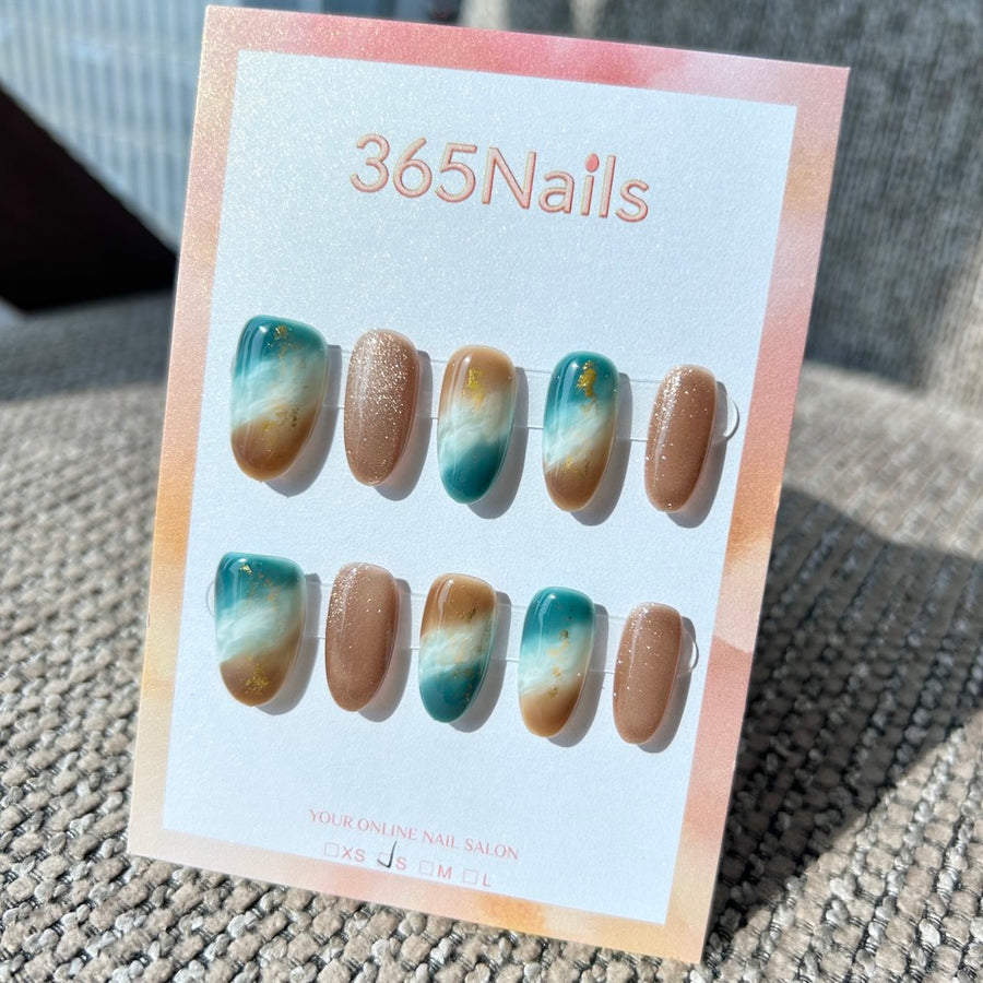 "Coastal Azure Sand" – Teal Blue & Beige Ocean Marble with Champagne Cat Eye & Gold Foil Oval Nails