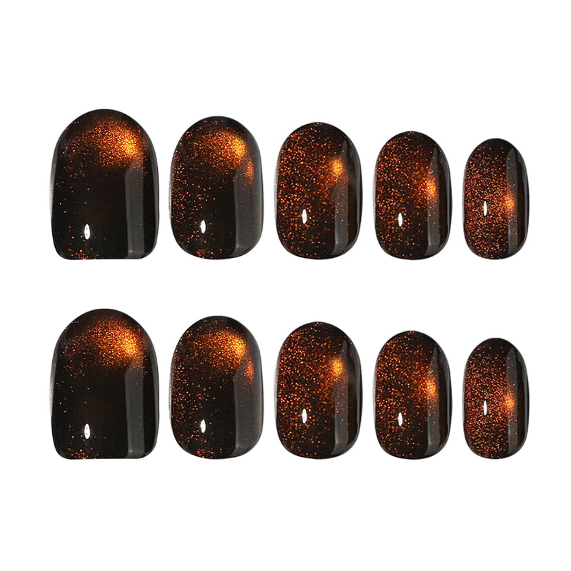 Ten brown cat-eye press-on nails in graduated sizes for a full set