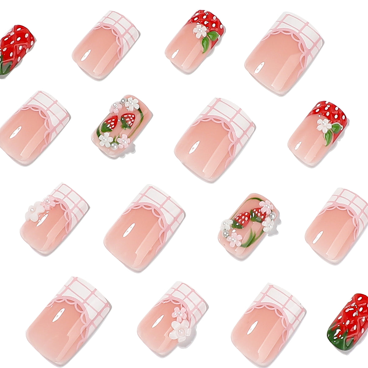 Close-up grid of pink square nails with strawberry, flower and lace accents
