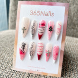 Femme Fatale: "Web of Romance" – Milky White Base with Red Spiderwebs, Gothic Calligraphy & Silver Cross Charms Long Stiletto Nails