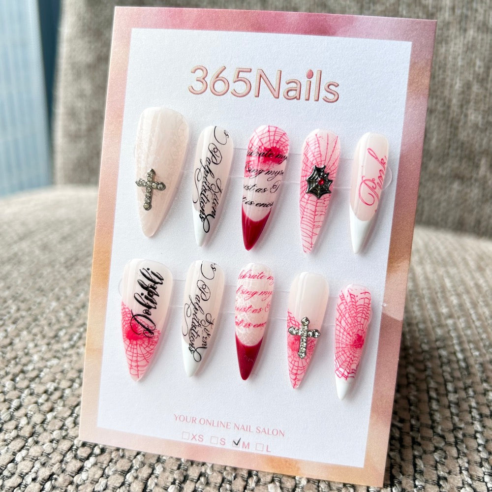 Femme Fatale: "Web of Romance" – Milky White Base with Red Spiderwebs, Gothic Calligraphy & Silver Cross Charms Long Stiletto Nails