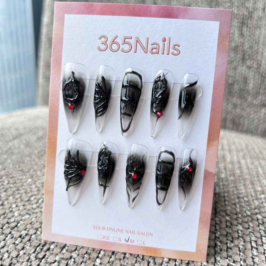 Femme Fatale: "Cœur Venimeux" – aérographe noir translucide avec texture liquide symbiote 3D et gemme rouge, ongles press-on longs forme stiletto