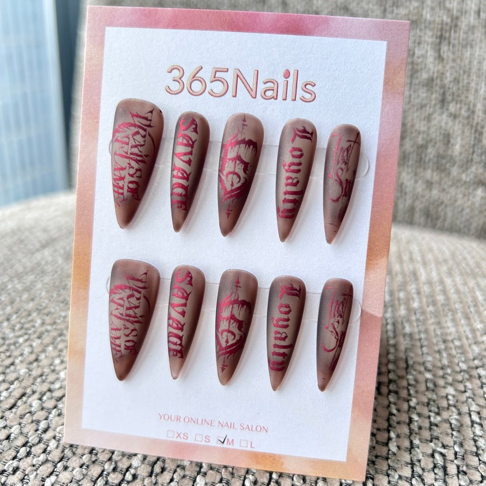 Femme Fatale: "Crimson Ink" – Matte Brown Base with Metallic Red Gothic Lettering, Tattoo Style Long Stiletto Nails