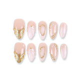 365nails nude pink shimmer with shell carving, gold edging and pearls almond press-onsSold in packs of 5. Minimum order: 1 pack (5 pcs). Quantity = number of packs. Qty 1 = 5 pcs