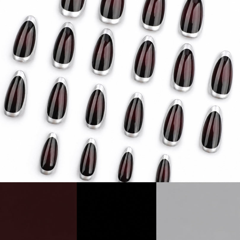 Close-up of glossy dark red almond nails with silver edges beside color swatches