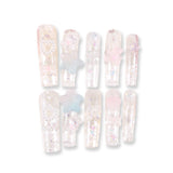 365Nails Iridescent Jelly Long Coffin Press On Nails with 3D Stars, Bows and PearlsSold in packs of 5. Minimum order: 1 pack (5 pcs). Quantity = number of packs. Qty 1 = 5 pcs