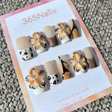 Sculpted Flora: "Wild Mocha Orchid" – 3D Spotted Beige Flowers & Cow Print French Square Nails