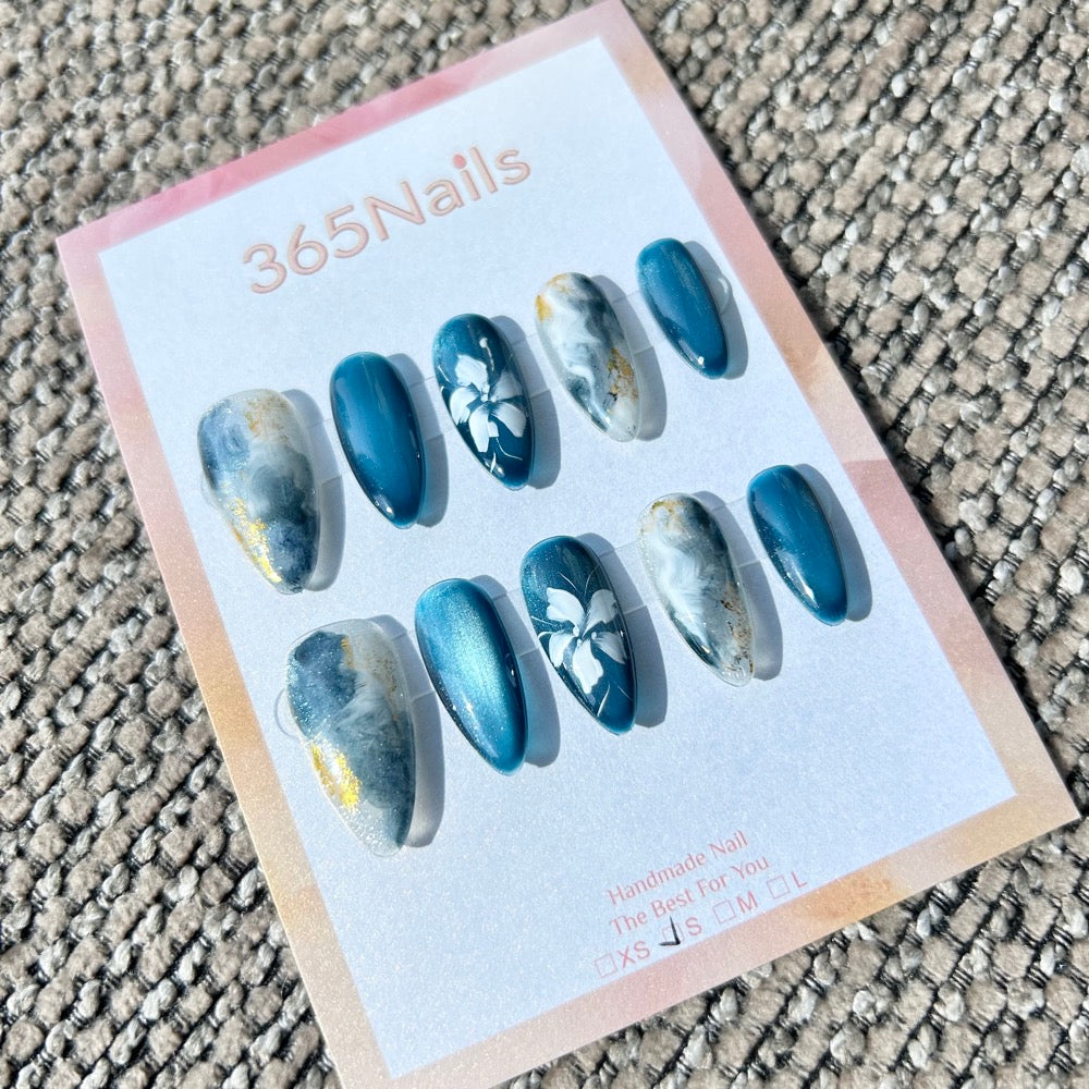 Ethereal Ink: "Azure Mist Floral" – Dusty Blue Cat Eye & Ink Marble with Hand-Painted White Flowers & Gold Foil Almond Nails