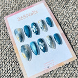 Ethereal Ink: "Azure Mist Floral" – Dusty Blue Cat Eye & Ink Marble with Hand-Painted White Flowers & Gold Foil Almond Nails