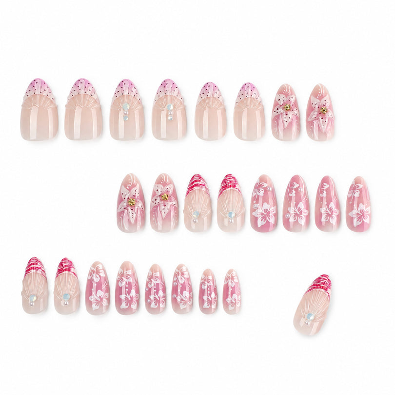 Set of 24 pink floral press-on nails arranged in rows