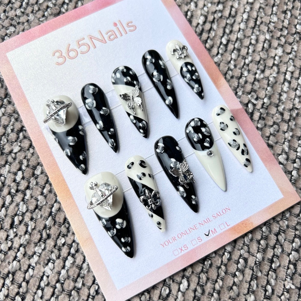 Femme Fatale: "Saturn Rebel" – Black & White Monochrome Leopard with Silver Planet Orb & Butterfly Charms Long Stiletto Nails