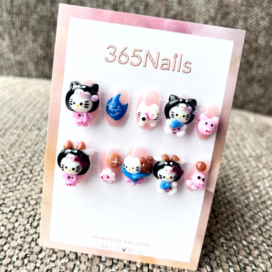365nails: "Kitty's Blue Bow" – 3D Hello Kitty Short Almond Nails