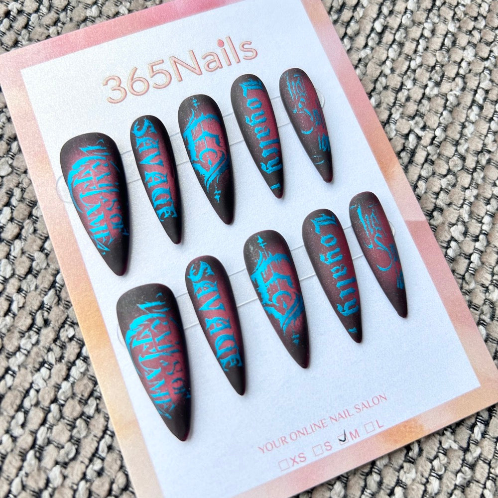 Femme Fatale: "Savage Loyalty" – Matte Black & Red Aura with Electric Blue Gothic Lettering Long Stiletto Nails