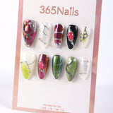 Uñas postizas 365Nails Cyber Beetle Cat-Eye con efecto ojo de gato y mezcla de metales.