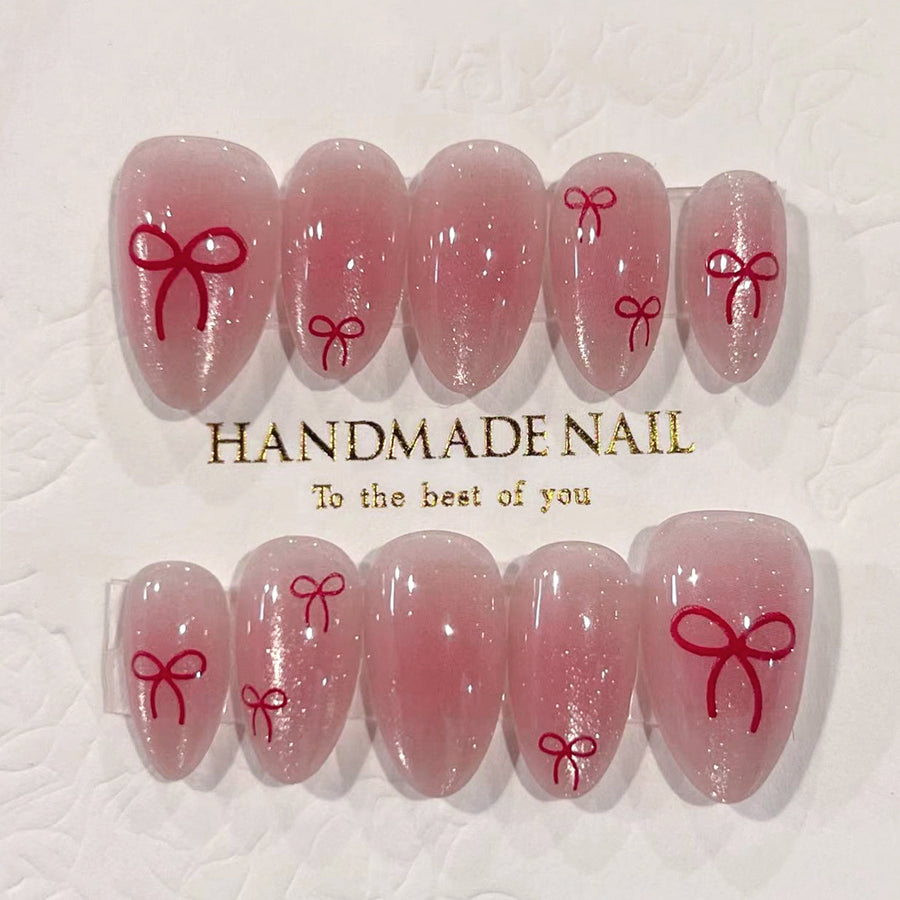 "Rose Pailleté et Nœud Rouge" - Ongles Press-on Fabriqués avec Précision
