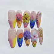 Fantaisie féerique : "Floraison jardin arc-en-ciel" – long forme amande multicolore floral, ongles press-on fait main