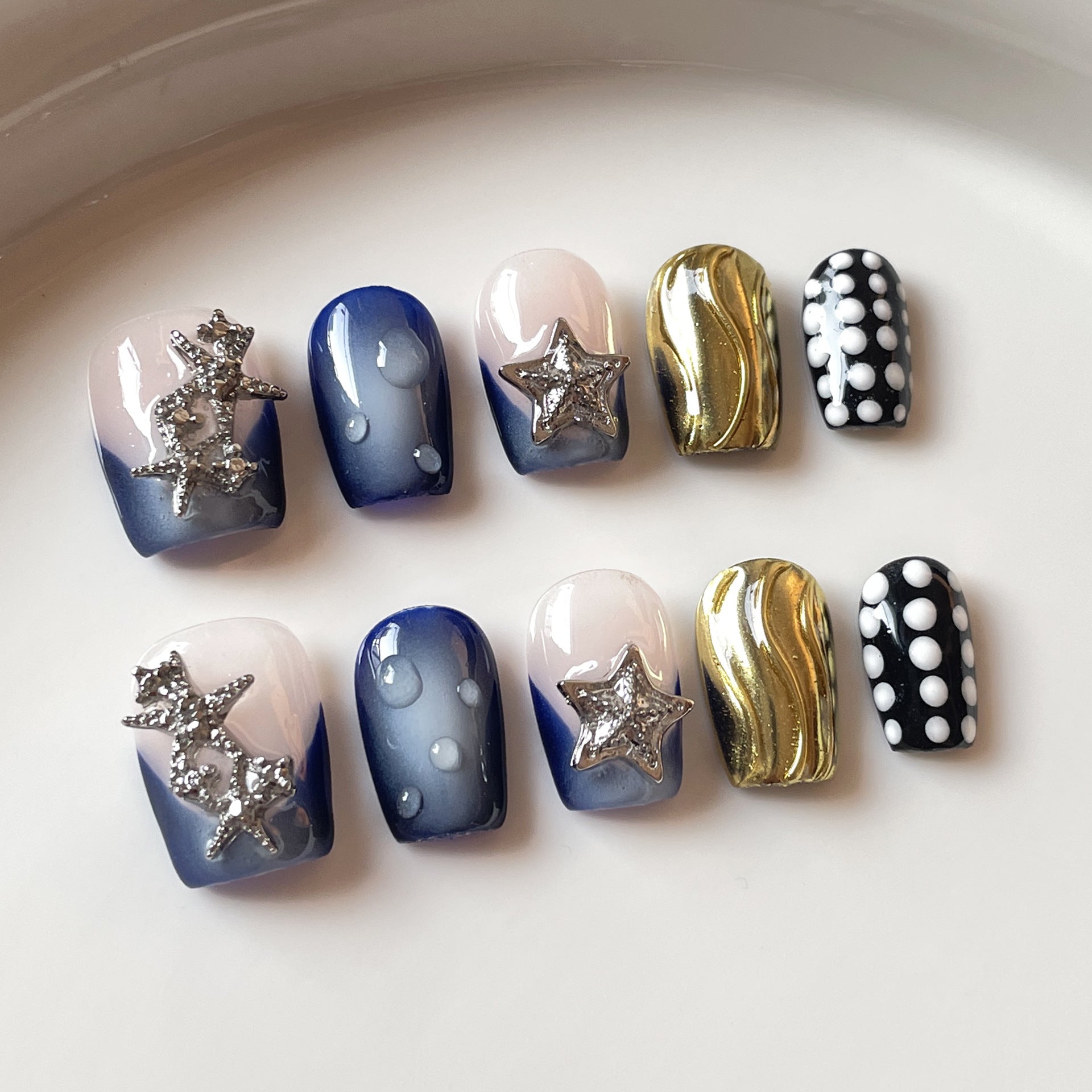 Starry Ocean Nails with Metallic Wave Accents