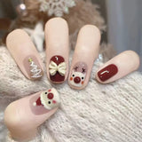 Santa Reindeer Hand‑Painted Christmas Press‑On Nails – Festive Bow Design
