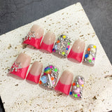 Red Gradient Nails with Star and Multicolor Crystal Accents