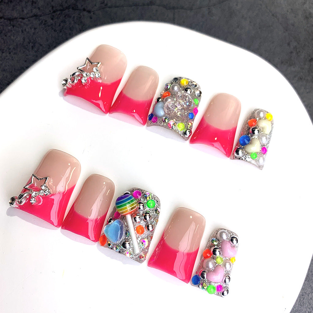 Red Gradient Nails with Star and Multicolor Crystal Accents