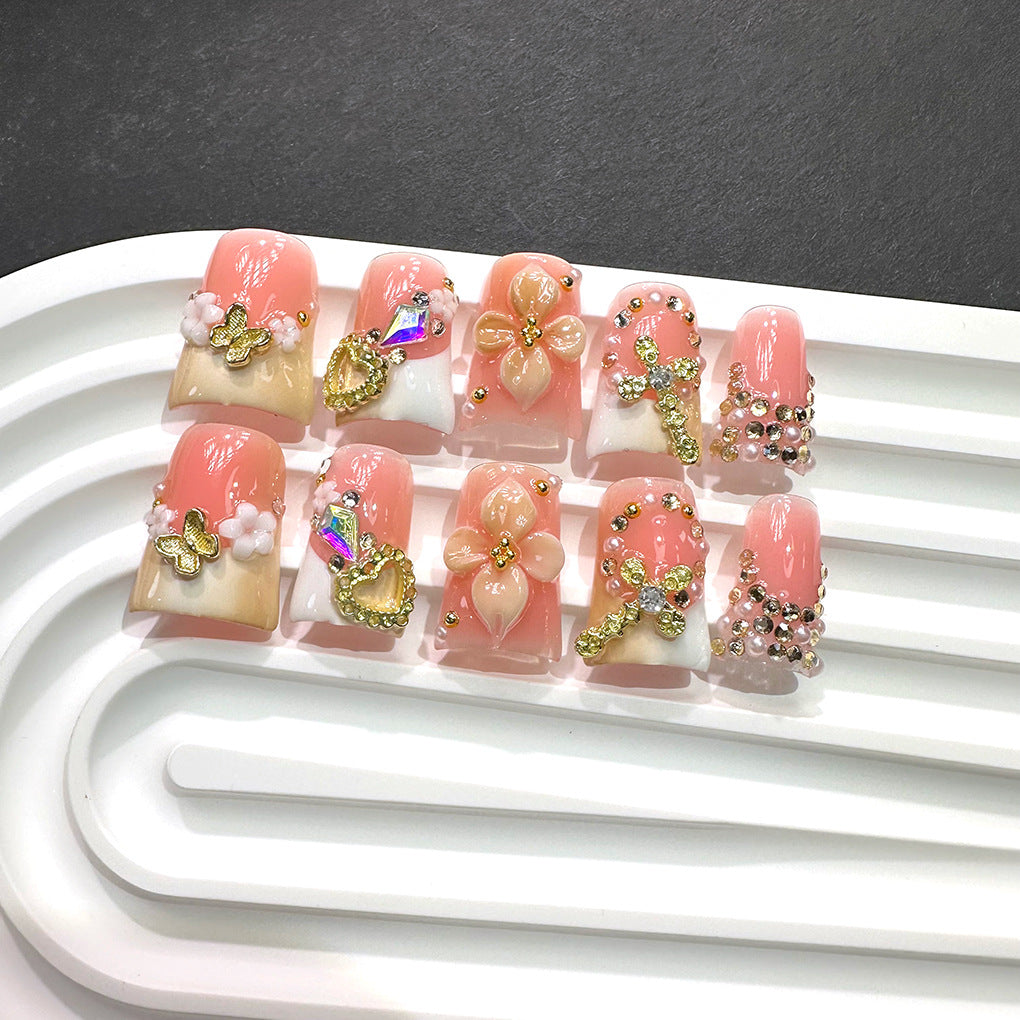 粉色法式穿戴甲，金色十字與花朵吊飾