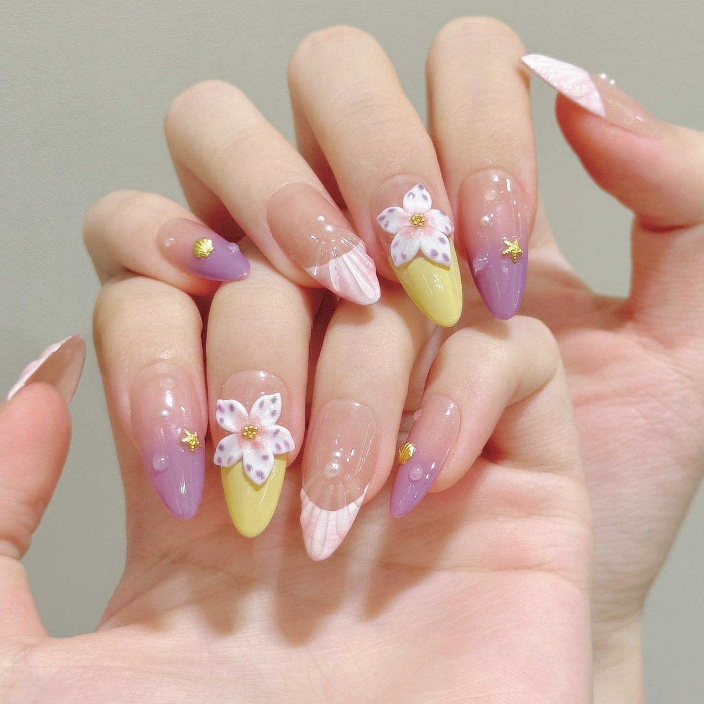 Pastel Gradient Floral Nails with Delicate 3D Accents