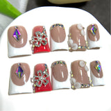 Nude French Nails with Red Accent and Crystal Floral Details