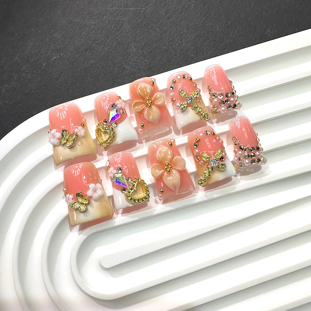 粉色法式穿戴甲，金色十字與花朵吊飾