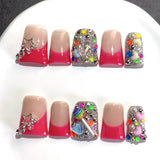 Red Gradient Nails with Star and Multicolor Crystal Accents